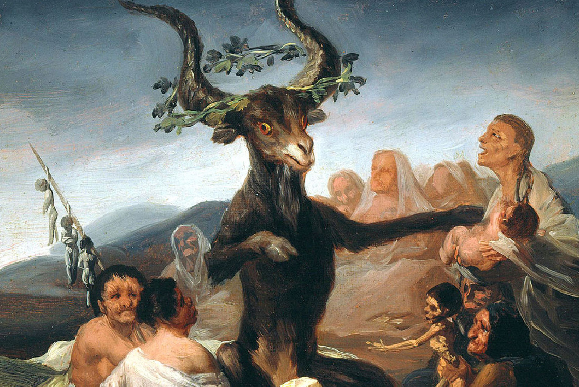Escena de aquelarre pintada por Goya con un grupo numeroso de figuras en penumbra.