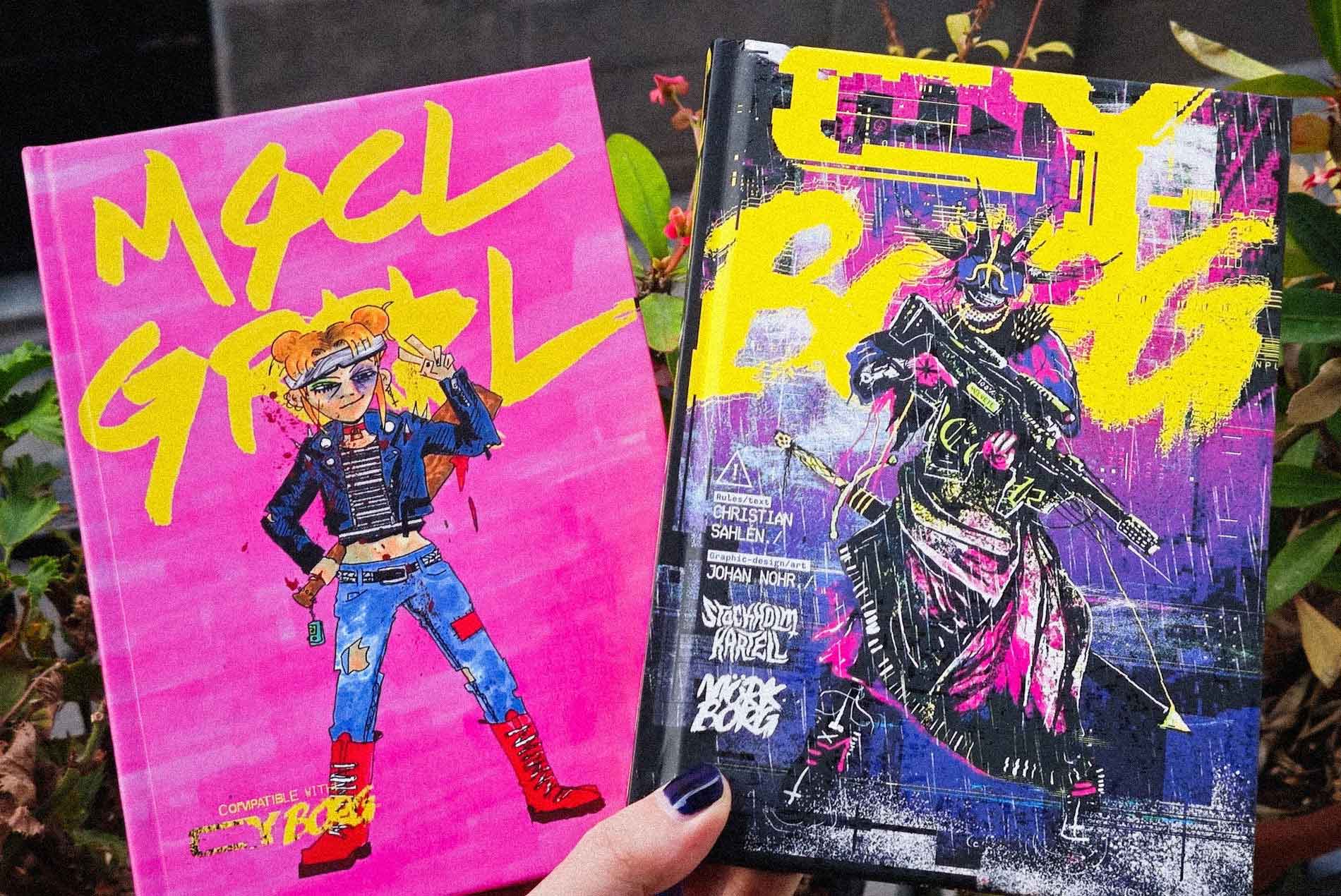 Portadas de Mgcl Grrrl junto a Cy_Borg, juego de rol indie de chicas mágicas y cyberpunk